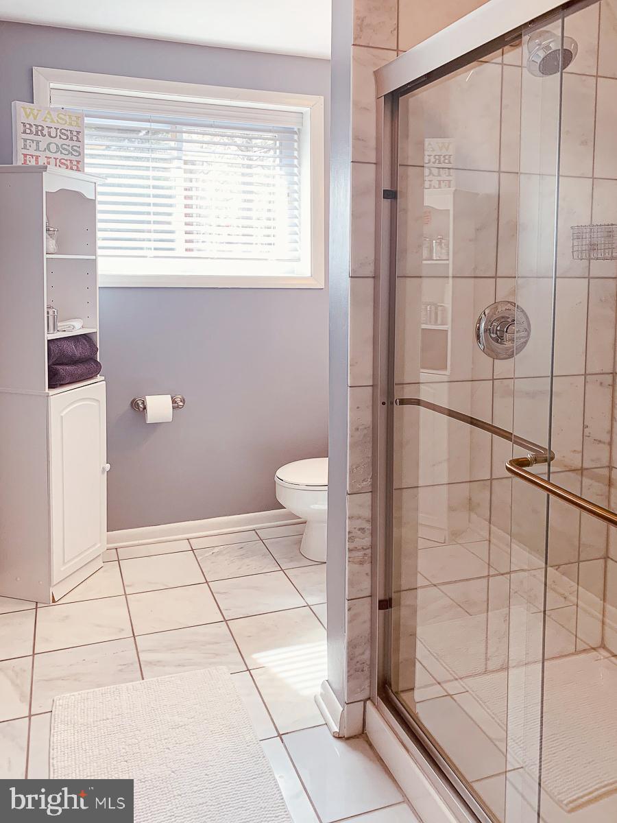 3301 Garrison Farms Road Pikesville, MD 21208 - Photo 32 of 41 Bright and airy modern bathroom retreat.
