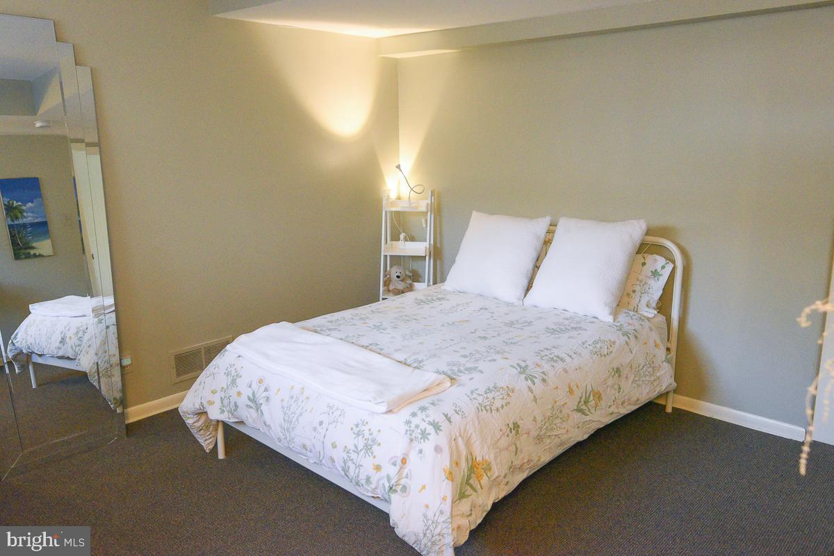 3301 Garrison Farms Road Pikesville, MD 21208 - Photo 33 of 41 Serene bedroom with soft, natural light.