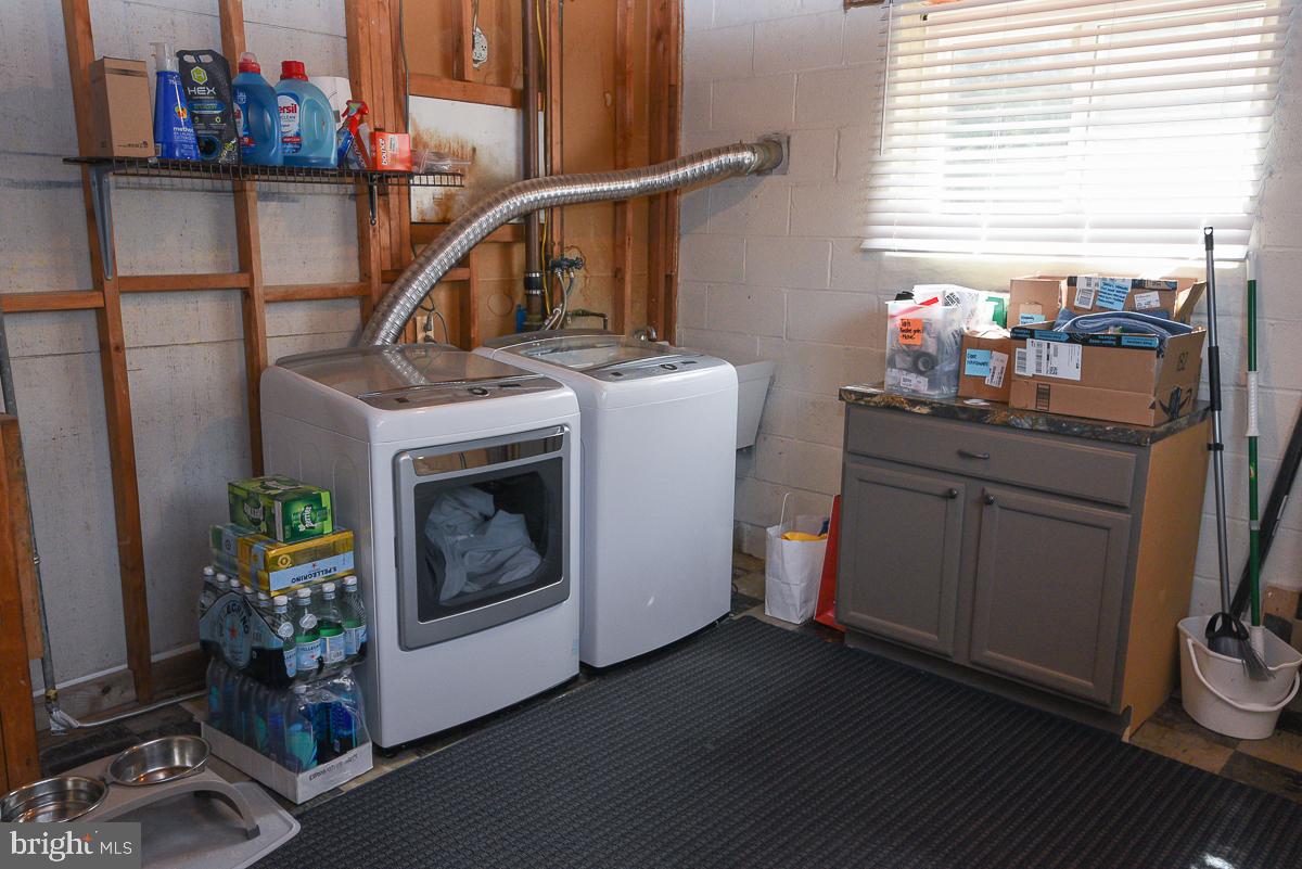 3301 Garrison Farms Road Pikesville, MD 21208 - Photo 34 of 41 Functional laundry space with ample storage.