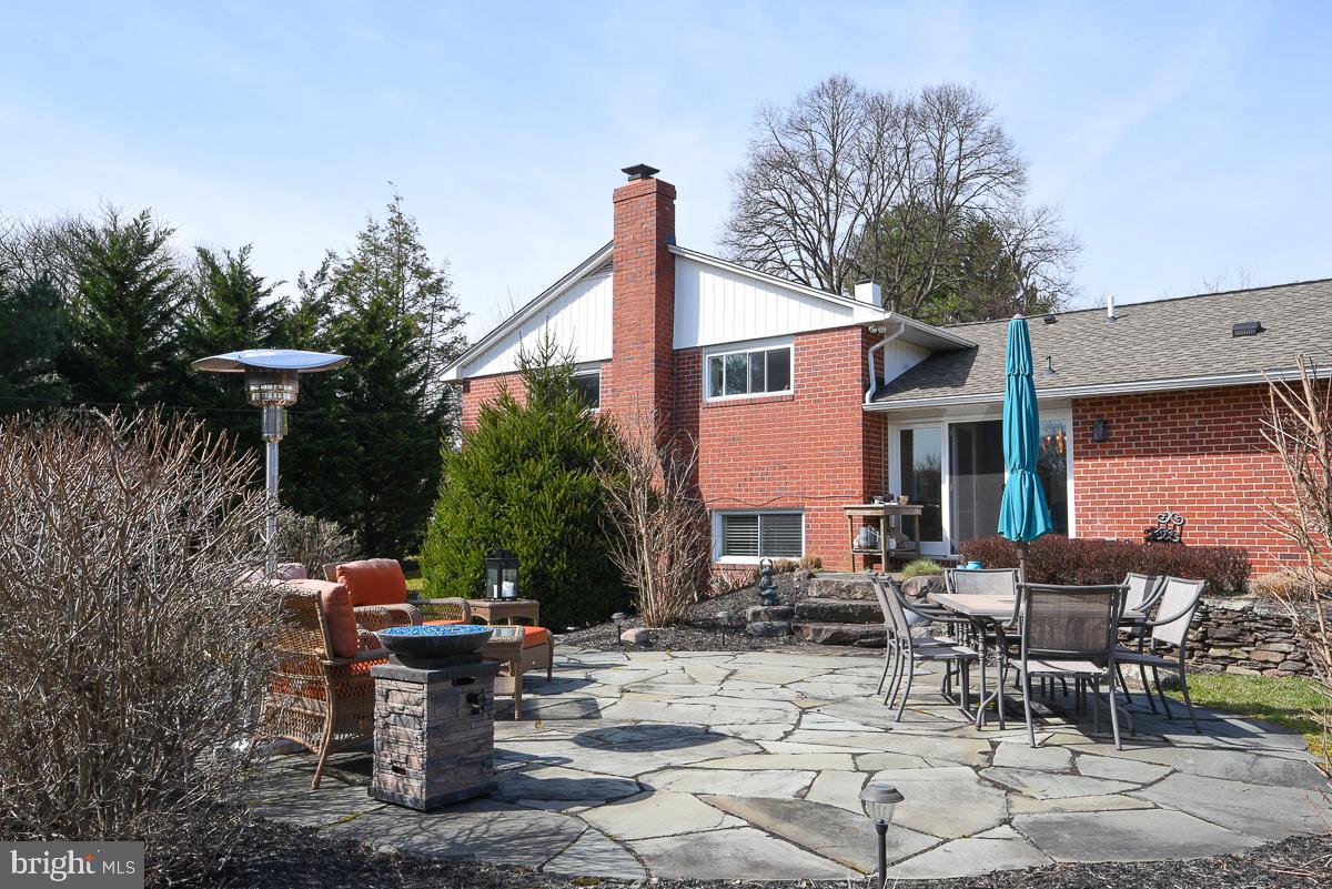 3301 Garrison Farms Road Pikesville, MD 21208 - Photo 37 of 41 Charming patio oasis for outdoor gatherings.