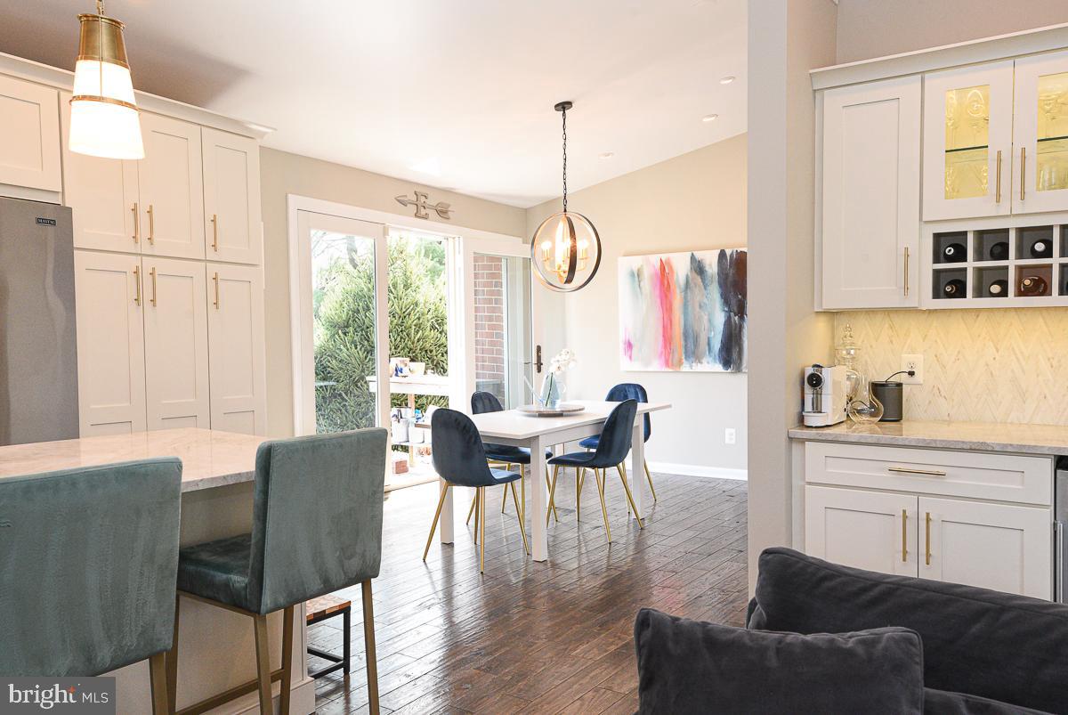 3301 Garrison Farms Road Pikesville, MD 21208 - Photo 5 of 41 Modern kitchen with elegant dining area.