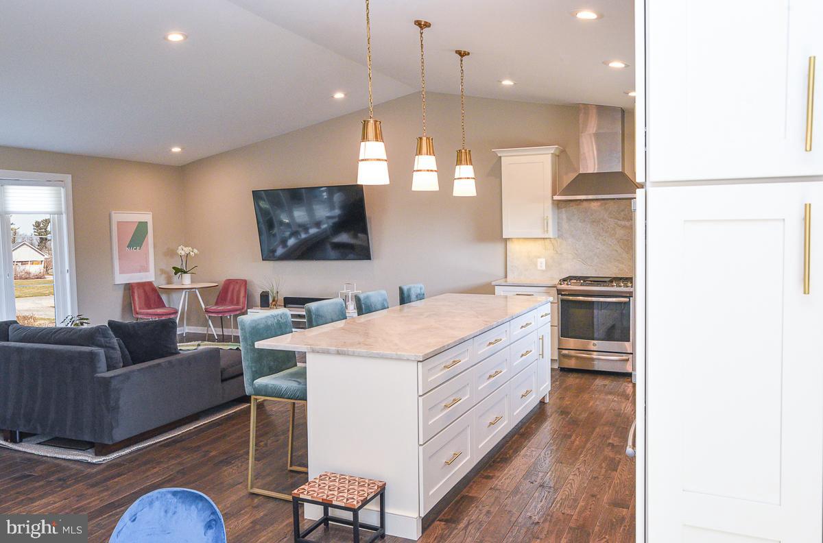 3301 Garrison Farms Road Pikesville, MD 21208 - Photo 6 of 41 Modern kitchen with stylish island seating.