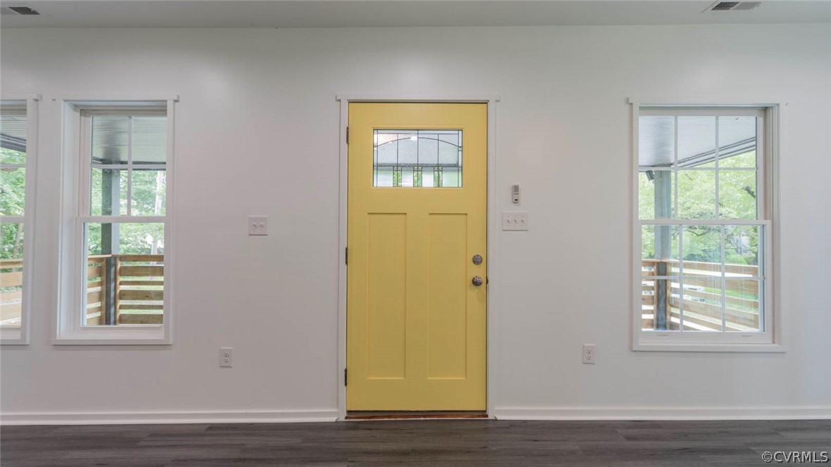 3616 Courthouse Road Hopewell, VA 23860 - Photo 13 of 40 a view of an empty room with wooden floor and a window