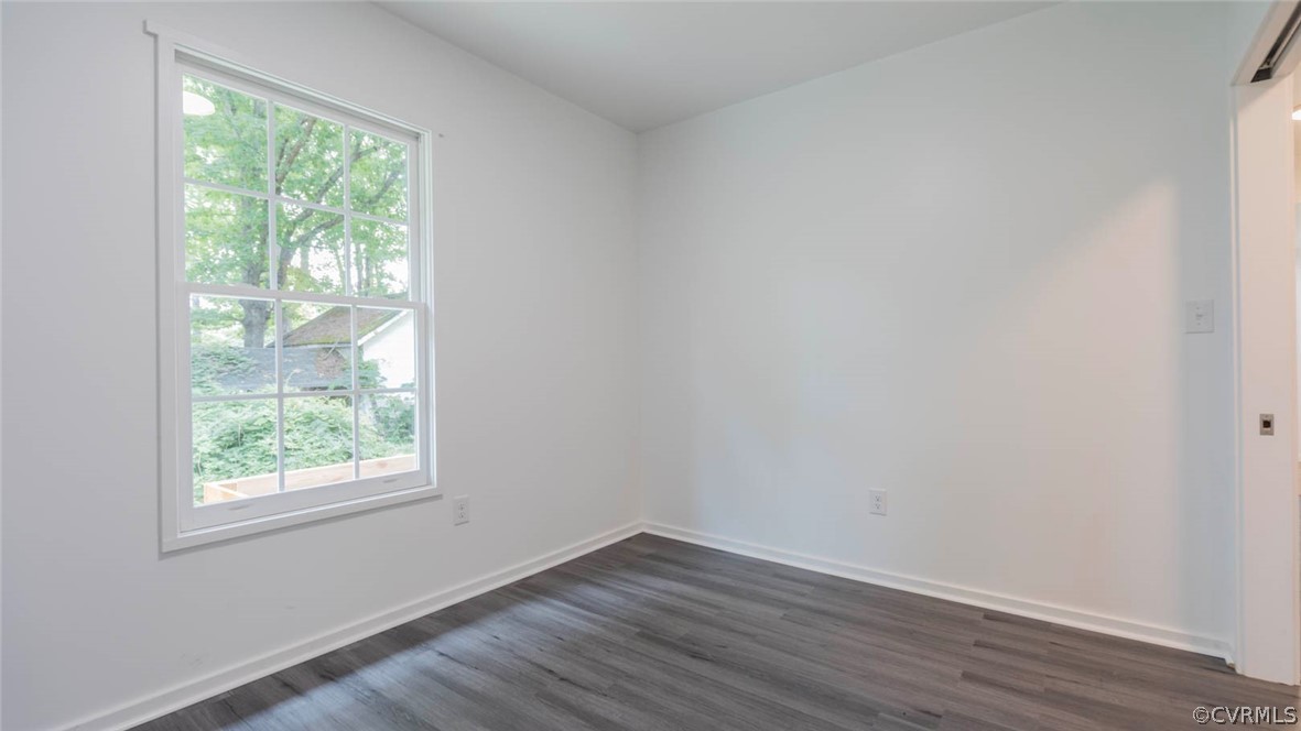 3616 Courthouse Road Hopewell, VA 23860 - Photo 23 of 40 a view of an empty room with wooden floor and a window