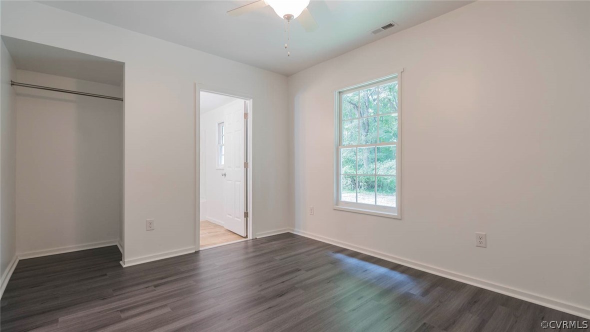 3616 Courthouse Road Hopewell, VA 23860 - Photo 26 of 40 an empty room with wooden floor and windows
