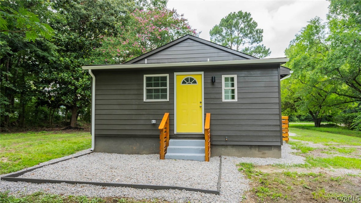 3616 Courthouse Road Hopewell, VA 23860 - Photo 3 of 40 a front view of a house with garden