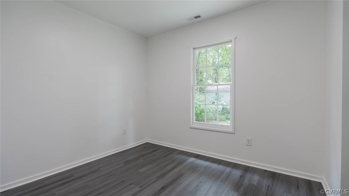 3616 Courthouse Road Hopewell, VA 23860 - Photo 31 of 40 an empty room with wooden floor and windows