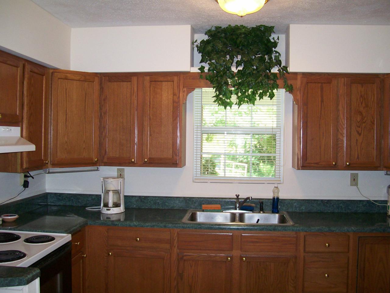 207 Farmington Road Hardy, VA 24101 - Photo 6 of 18 a kitchen with sink a window and cabinets