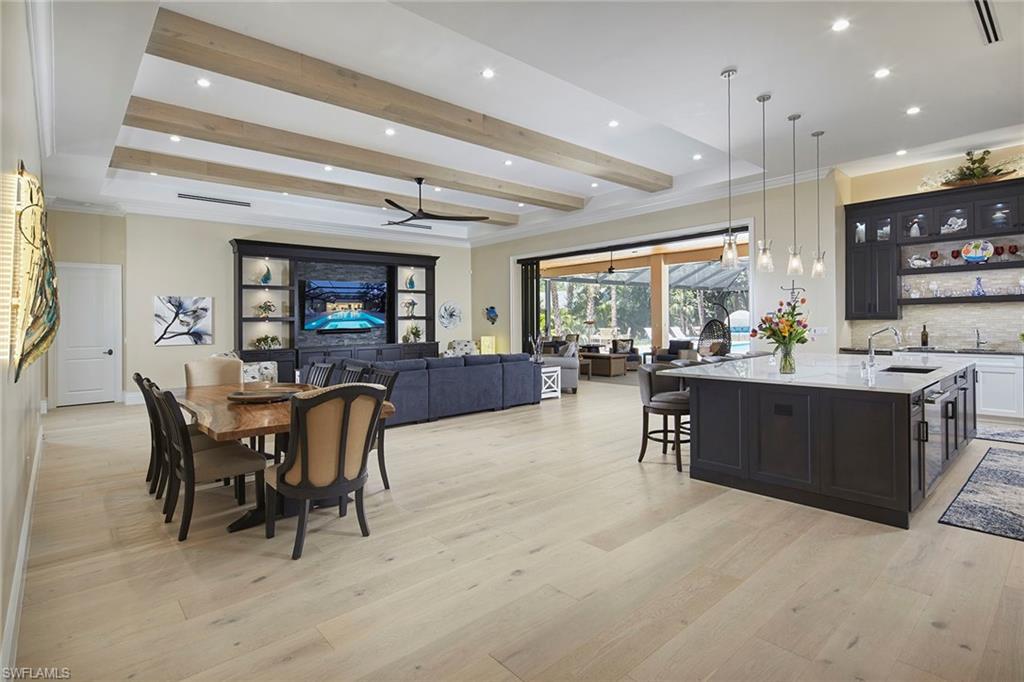 5301 Tamarind Ridge Drive Naples, FL 34119 - Photo 12 of 50 a view of a dining room with furniture