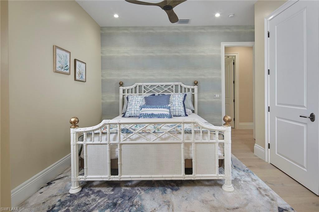 5301 Tamarind Ridge Drive Naples, FL 34119 - Photo 36 of 50 a view of a room with bed and a window