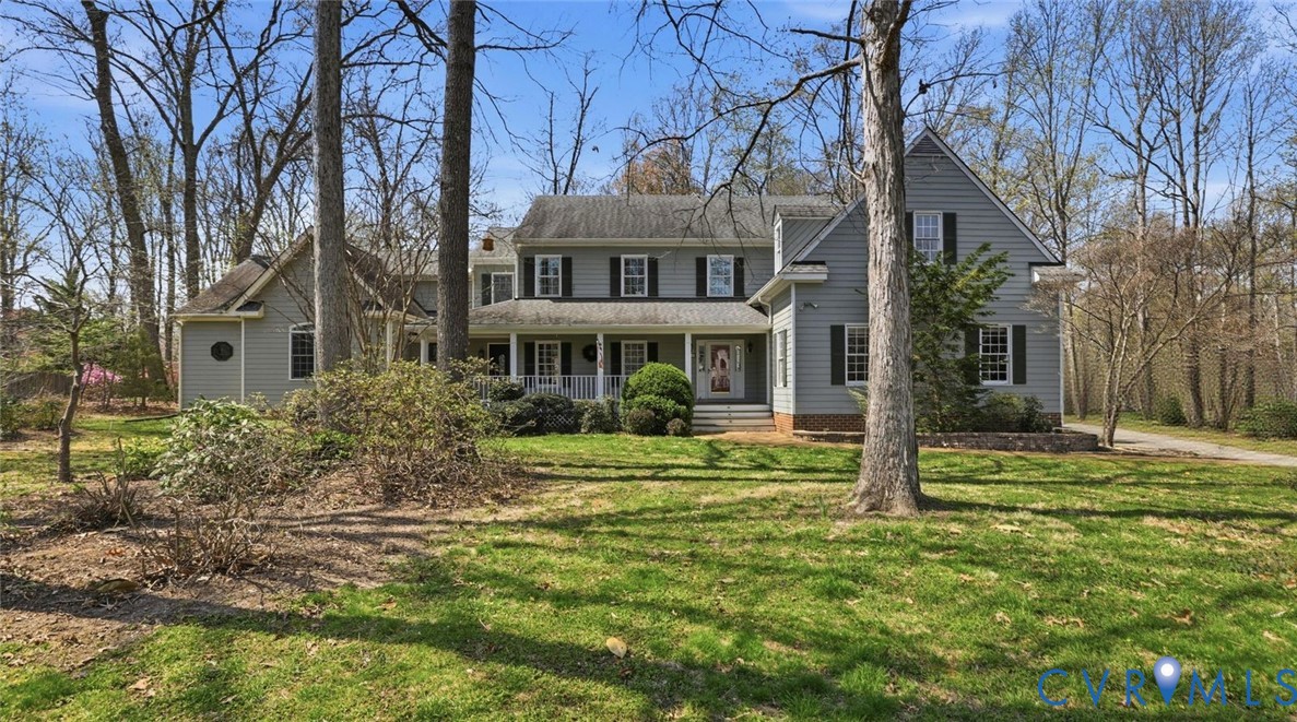 2560 Chartstone Drive Midlothian, VA 23113 - Photo 2 of 44 a front view of a house with a yard