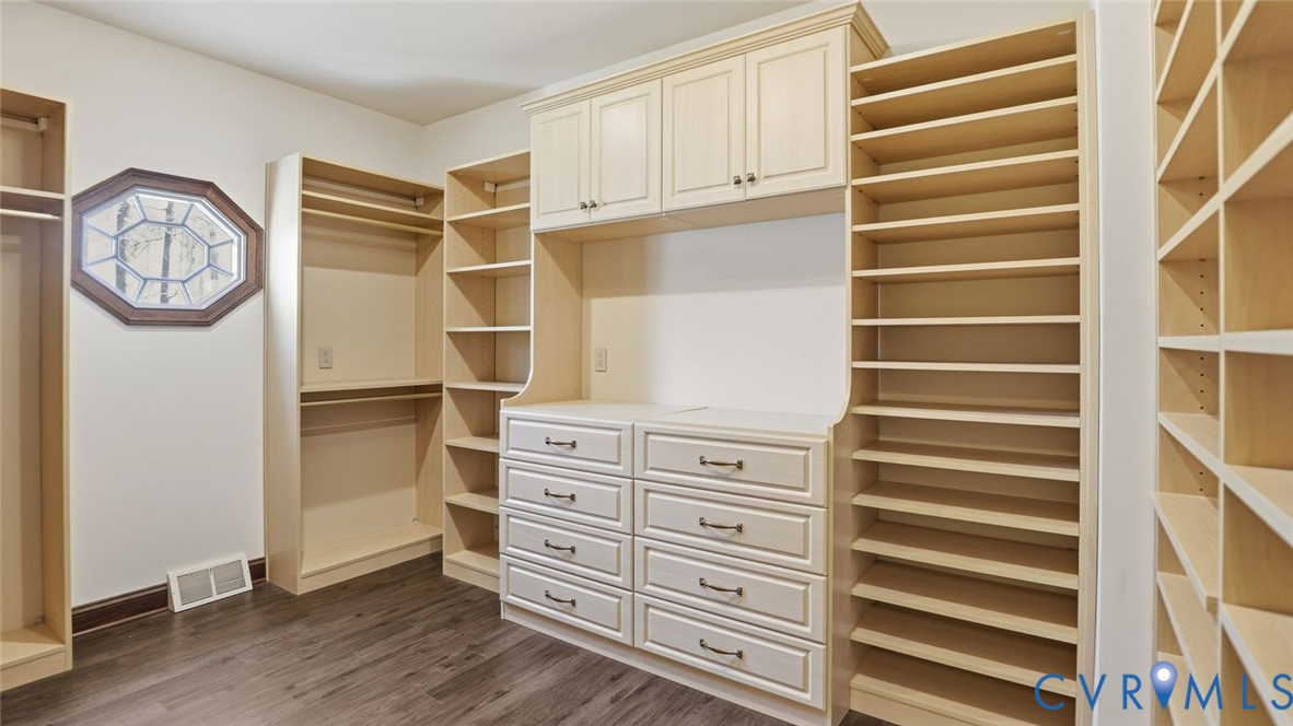2560 Chartstone Drive Midlothian, VA 23113 - Photo 24 of 44 a view of walk in closet with clothes and shoes