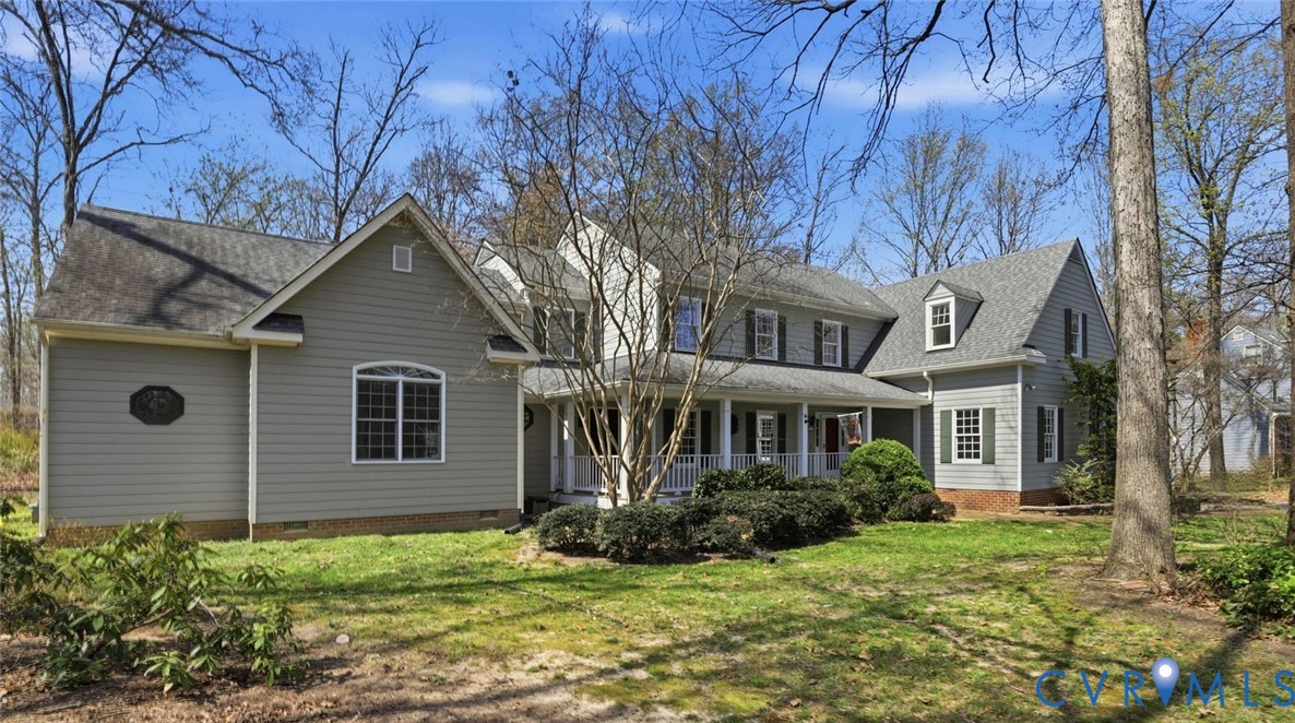 2560 Chartstone Drive Midlothian, VA 23113 - Photo 3 of 44 a front view of a house with a yard