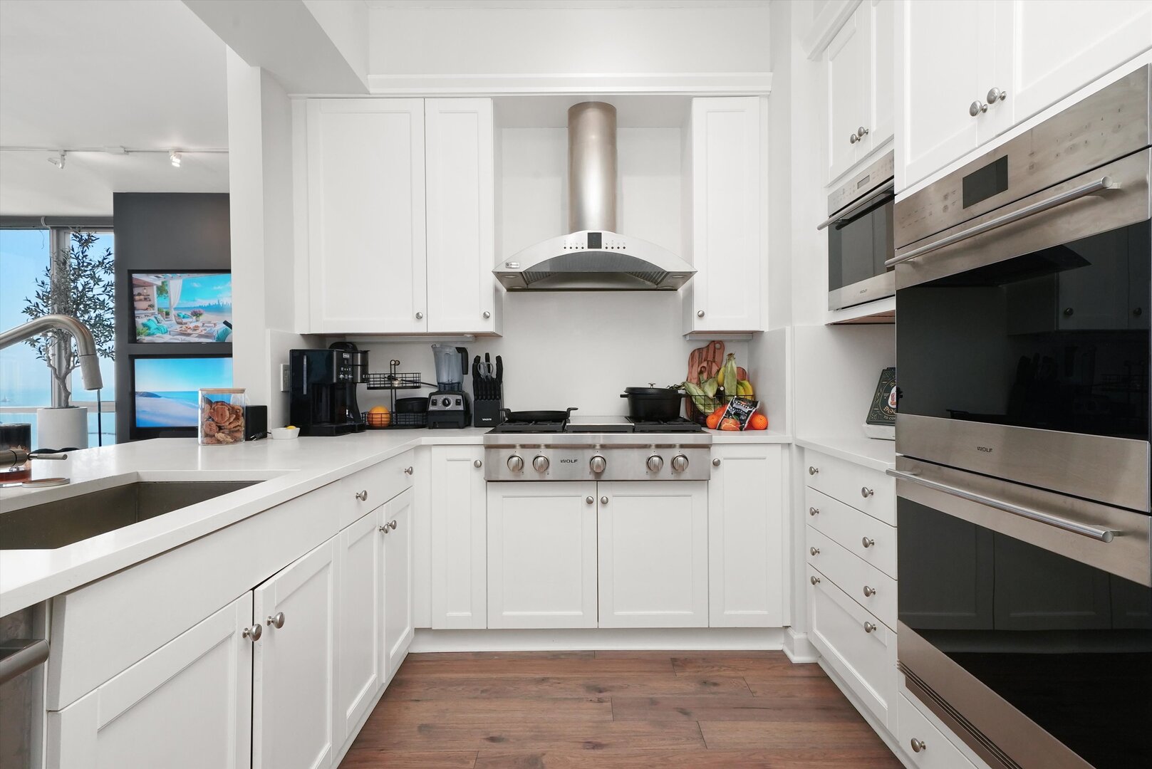 1201 South Prairie Avenue, Unit 2403 Chicago, IL 60605 - Photo 16 of 52 a kitchen with stainless steel appliances granite countertop a sink and cabinets