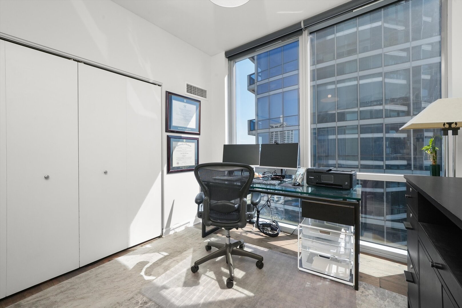 1201 South Prairie Avenue, Unit 2403 Chicago, IL 60605 - Photo 28 of 52 a workspace with furniture and a window