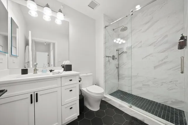 a bedroom with furniture and a couch