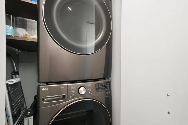 a room with lots of chairs and large windows