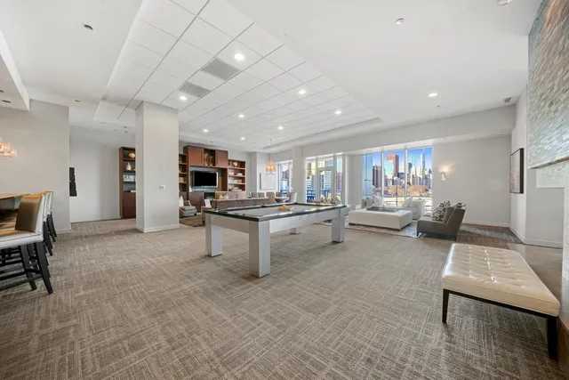 a view of roof with city view