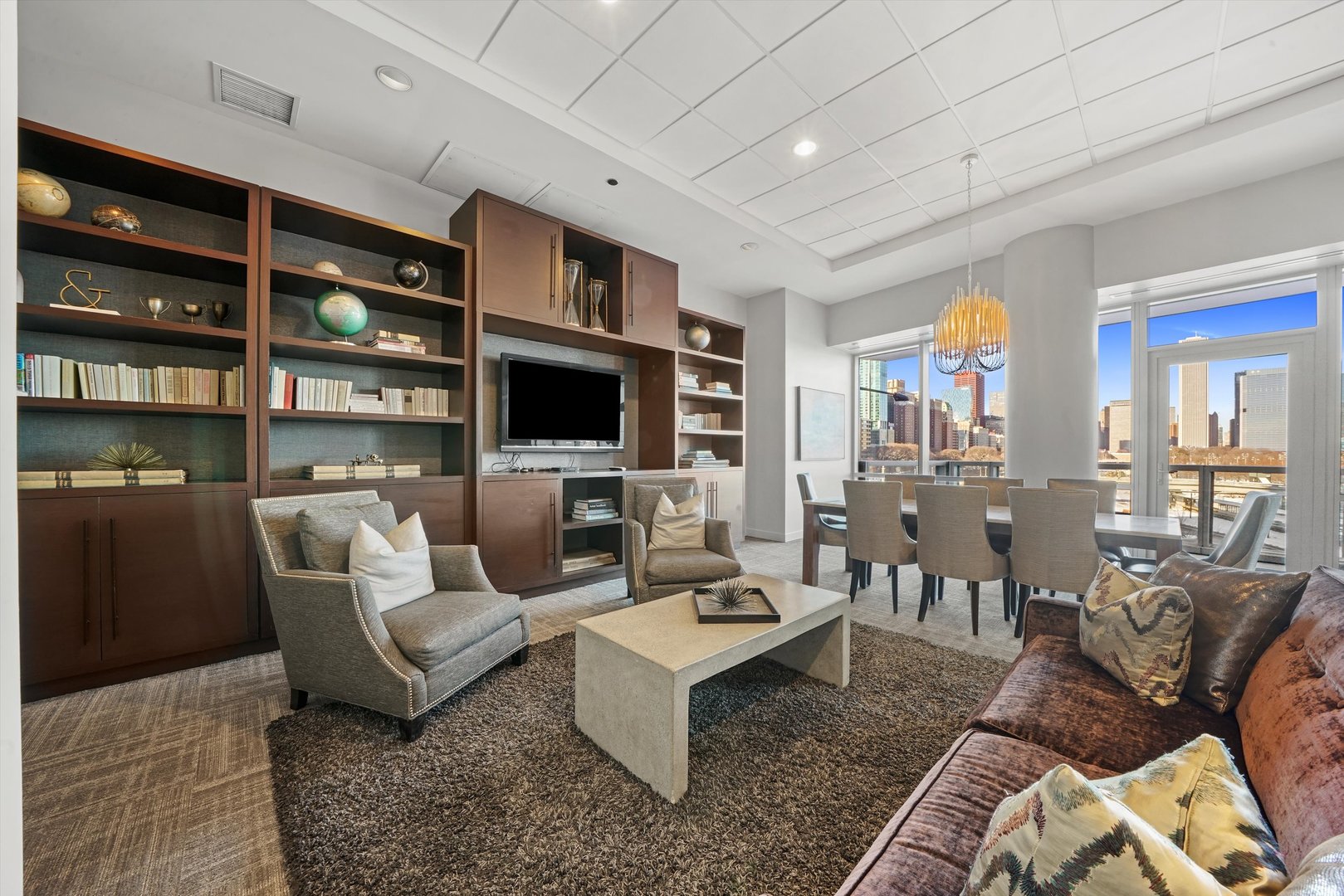 1201 South Prairie Avenue, Unit 2403 Chicago, IL 60605 - Photo 41 of 52 a living room with furniture a rug and a flat screen tv