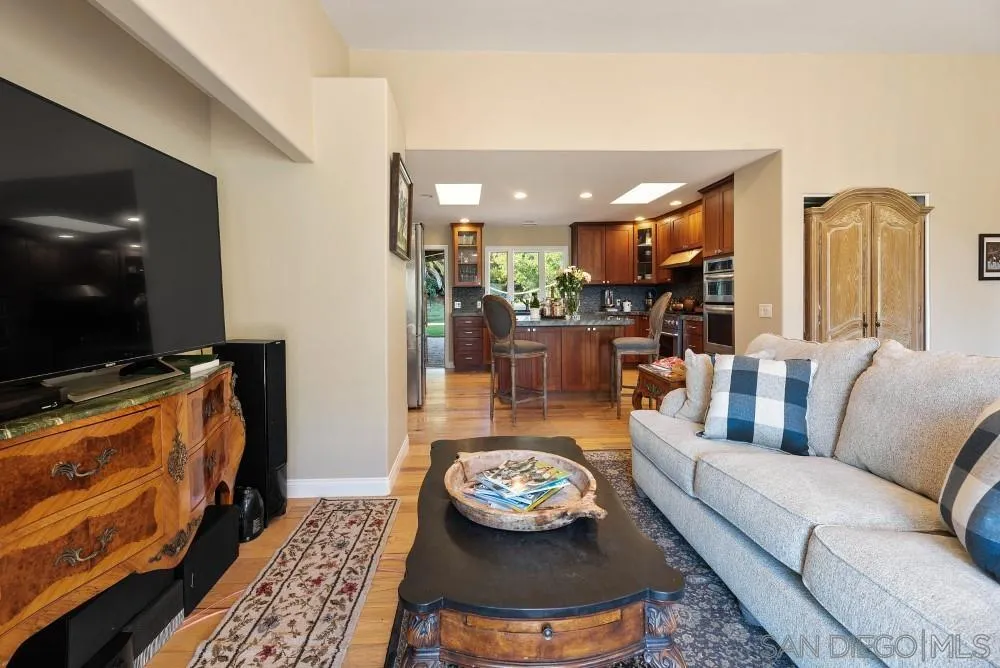 16919 Reposa Alta Rancho Santa Fe, CA 92067 - Photo 13 of 51 a living room with furniture and a flat screen tv