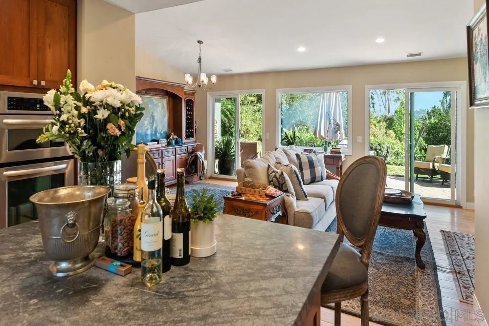16919 Reposa Alta Rancho Santa Fe, CA 92067 - Photo 22 of 51 a view of a dining room with furniture window and outside view