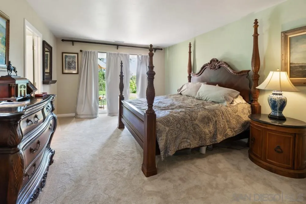 16919 Reposa Alta Rancho Santa Fe, CA 92067 - Photo 23 of 51 a bed room with a bed and a tv