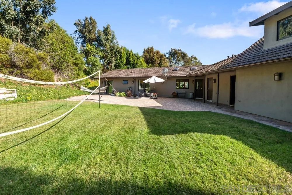 16919 Reposa Alta Rancho Santa Fe, CA 92067 - Photo 34 of 51 a house view with a garden space