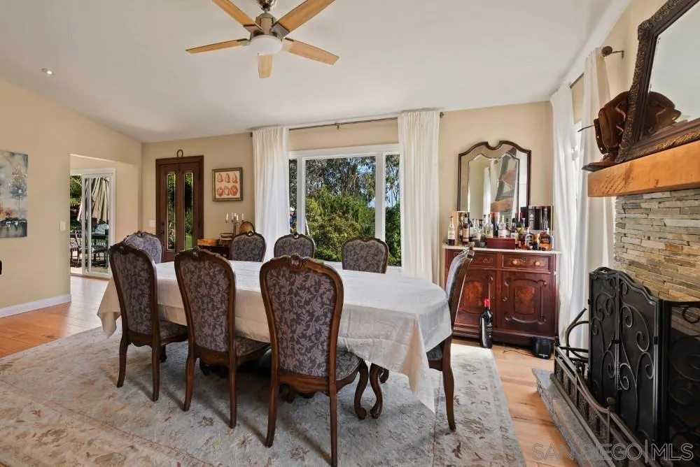 16919 Reposa Alta Rancho Santa Fe, CA 92067 - Photo 6 of 51 a view of a dining room with furniture window and outside view