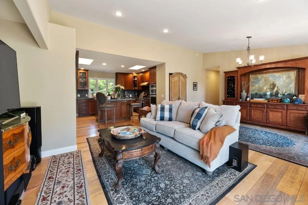 16919 Reposa Alta Rancho Santa Fe, CA 92067 - Photo 9 of 51 a living room with furniture and a flat screen tv