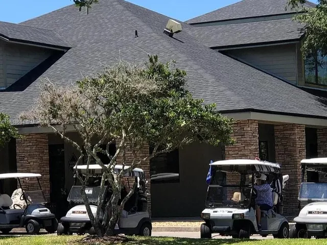 a front view of a house with yard