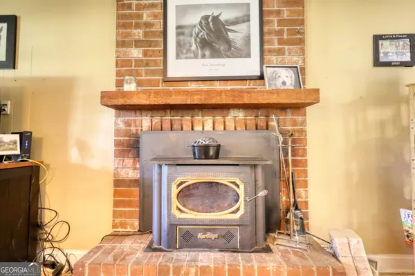 a view of a fireplace with a sink
