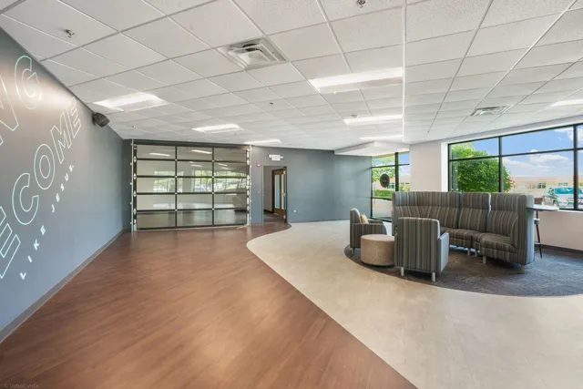 a room with furniture and view of living room