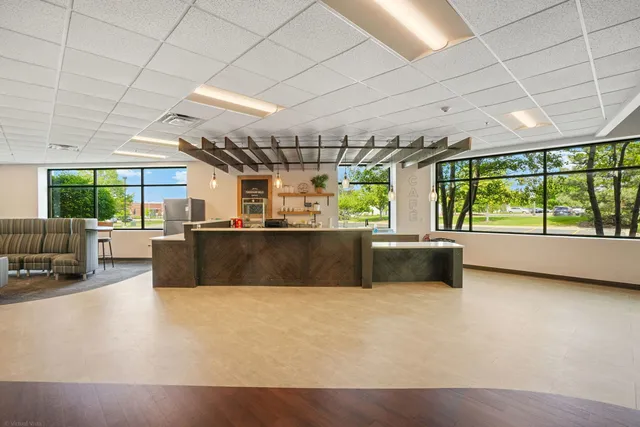 a large white building with a large window