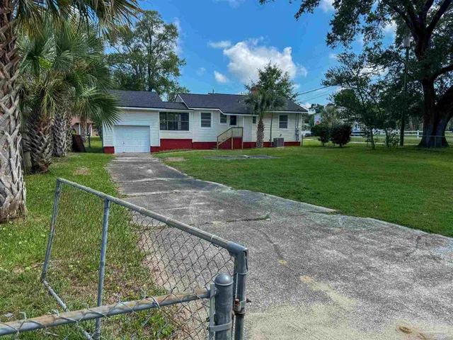 a view of house with outdoor space