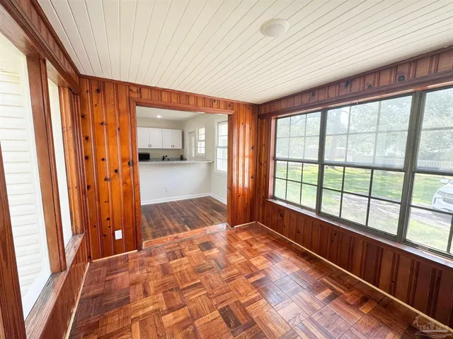 a view of hallway with a large window