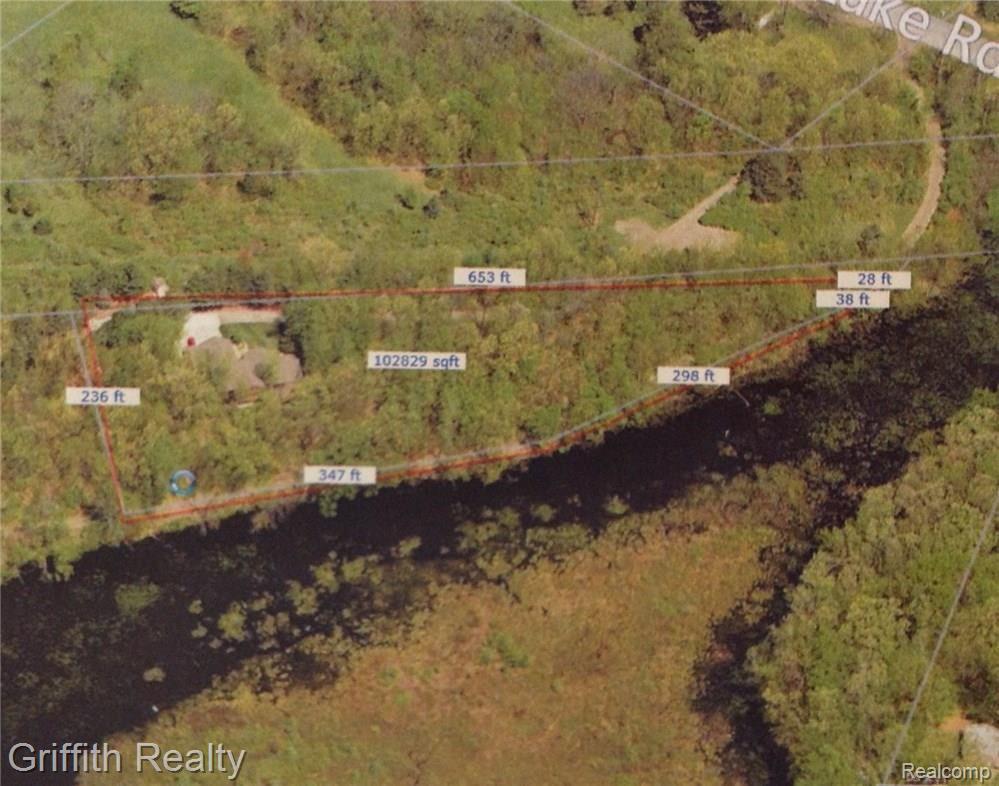 12502 White Lake Road Fenton, MI 48430 - Photo 8 of 8 Secluded retreat, yet close to city conveniences. Lot dimensions-Pond views!
