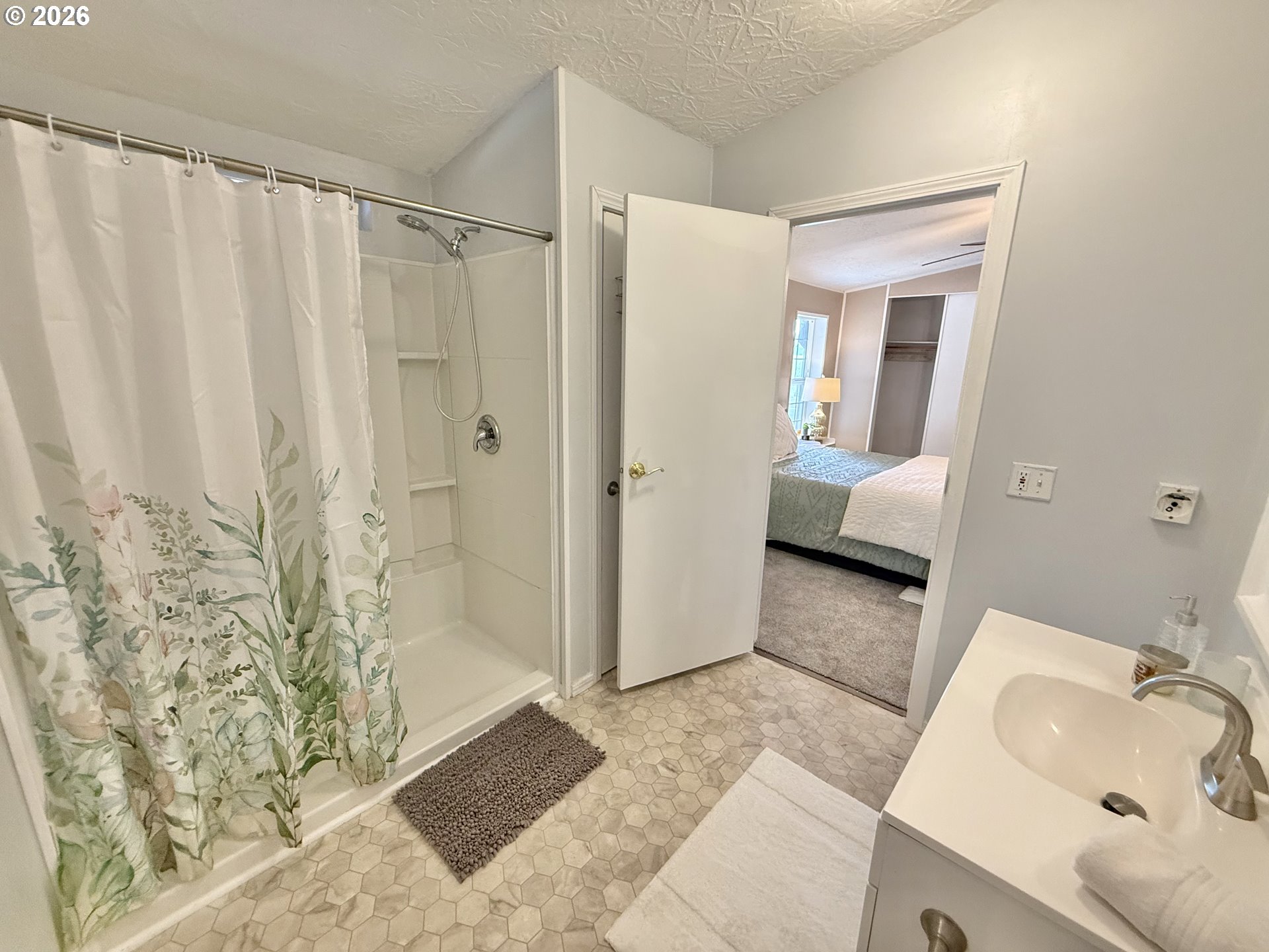 1282 3rd Street, Unit 37 Lafayette, OR 97127 - Photo 12 of 28 a bathroom with a sink and a mirror