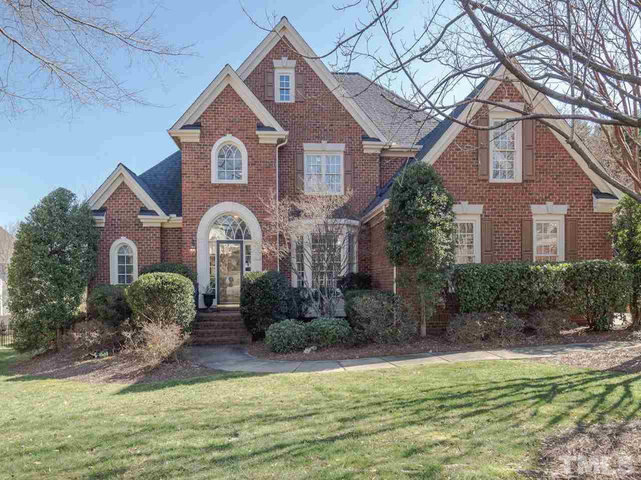 4604 Whitmire Place Raleigh, NC 27612 - Photo 1 of 25 a front view of a house with garden