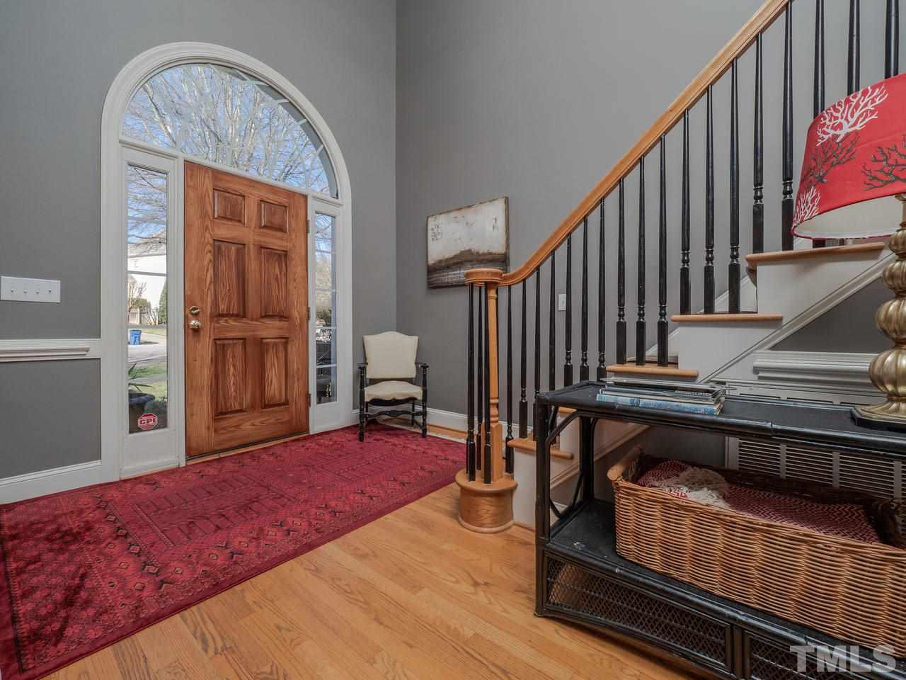 4604 Whitmire Place Raleigh, NC 27612 - Photo 3 of 25 a view of a livingroom with furniture and staircase