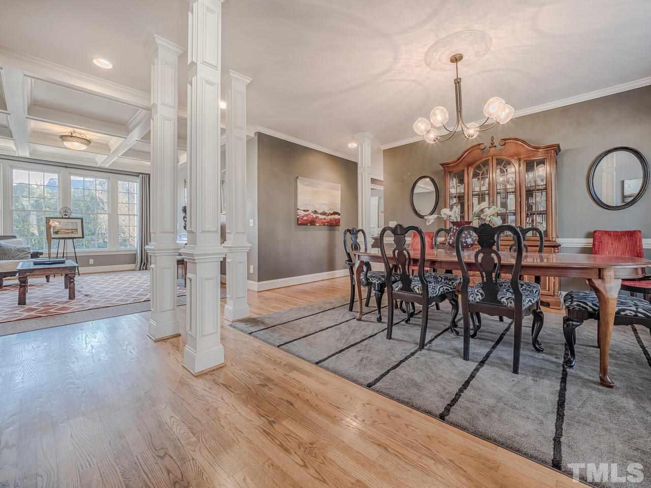 4604 Whitmire Place Raleigh, NC 27612 - Photo 4 of 25 a view of a dining room with furniture and wooden floor