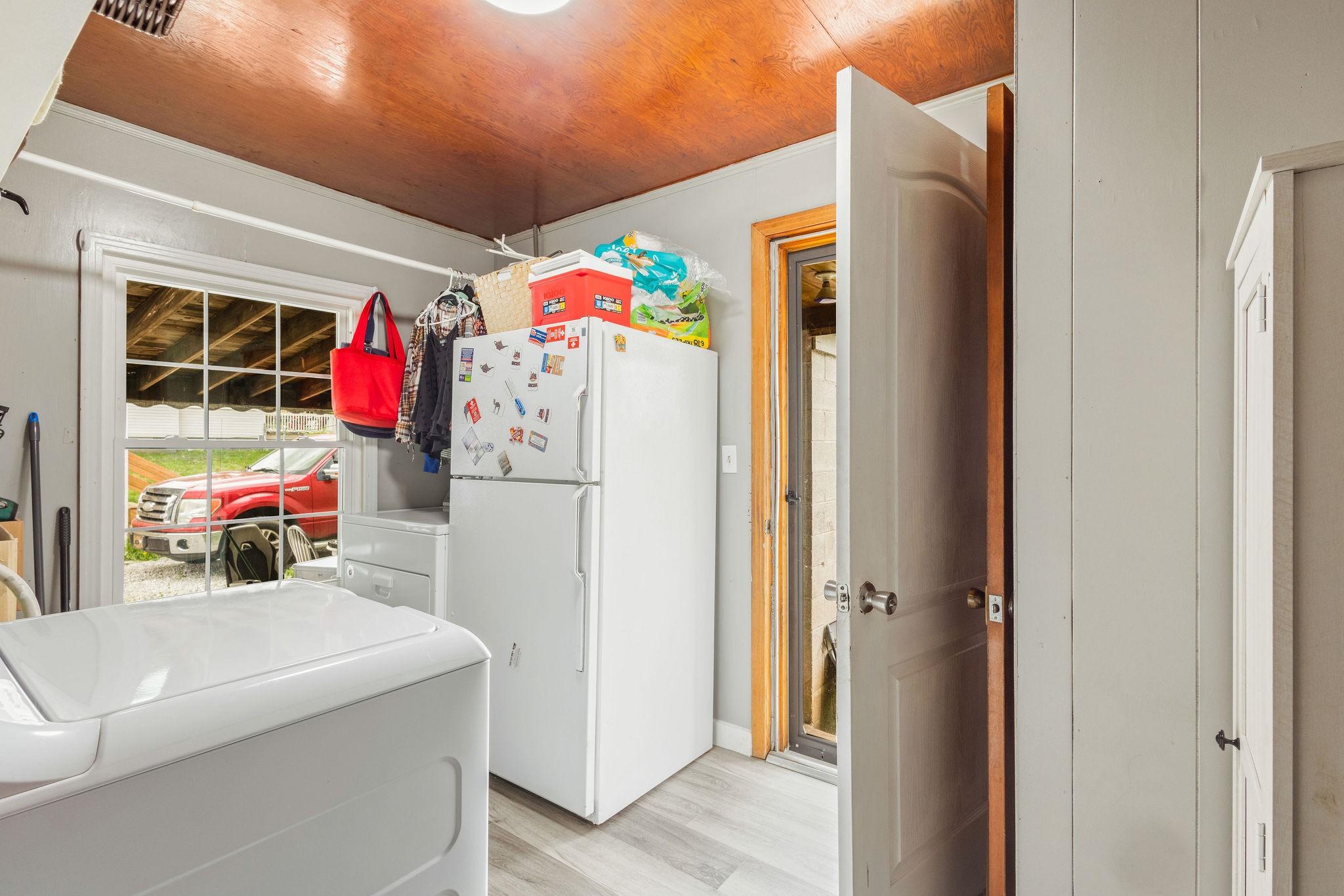 713 North Vine Street Winchester, TN 37398 - Photo 23 of 23 a utility room with fridge and washer dryer