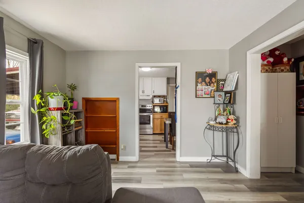 a living room with furniture and a window