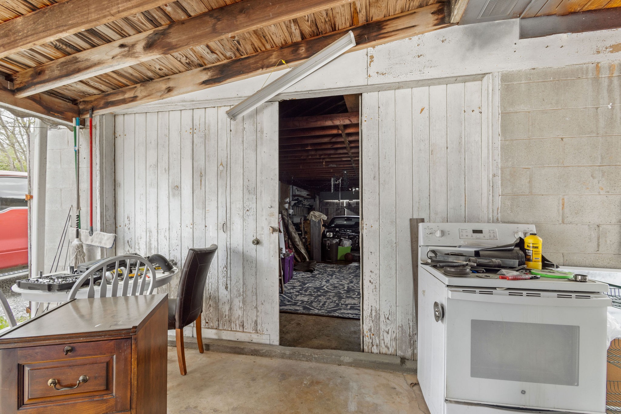 713 North Vine Street Winchester, TN 37398 - Photo 9 of 23 a kitchen with a refrigerator and a stove