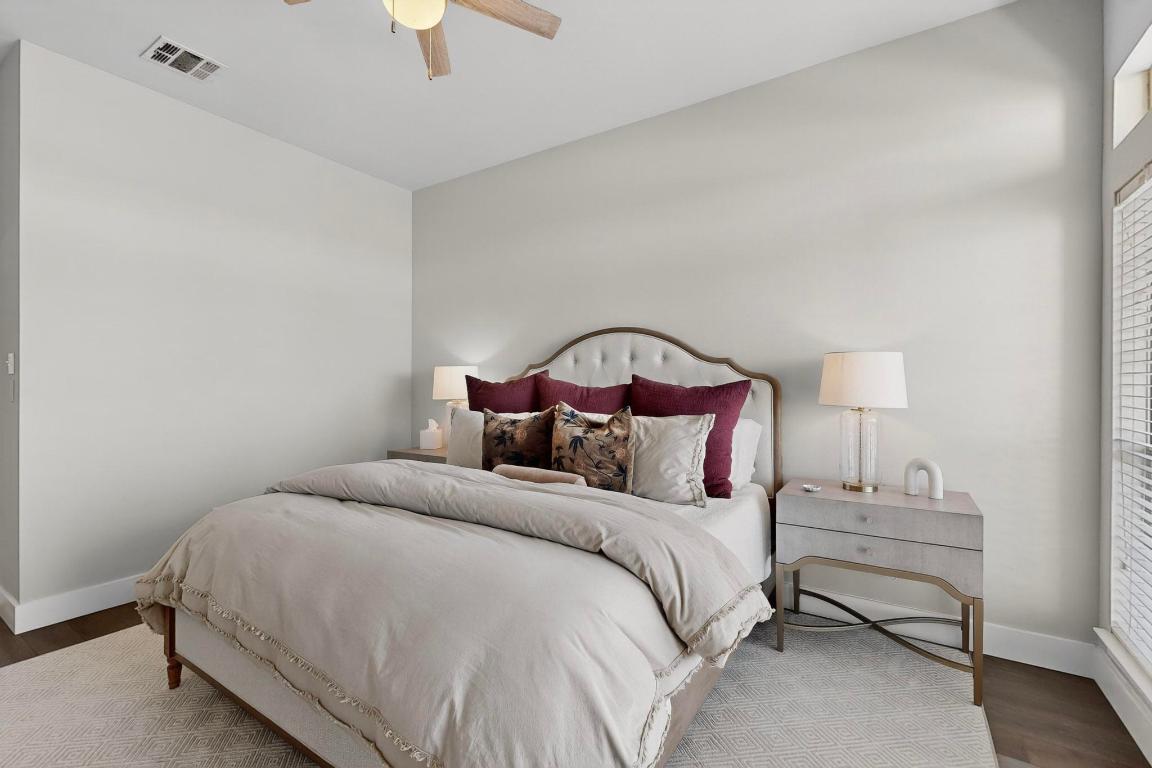 2918 Ranch Road 620 North, Unit T250 Austin, TX 78734 - Photo 11 of 22 a bedroom with a bed and a lamp
