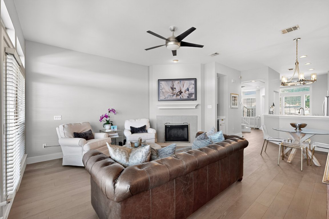 2918 Ranch Road 620 North, Unit T250 Austin, TX 78734 - Photo 3 of 22 a living room with furniture and a fireplace