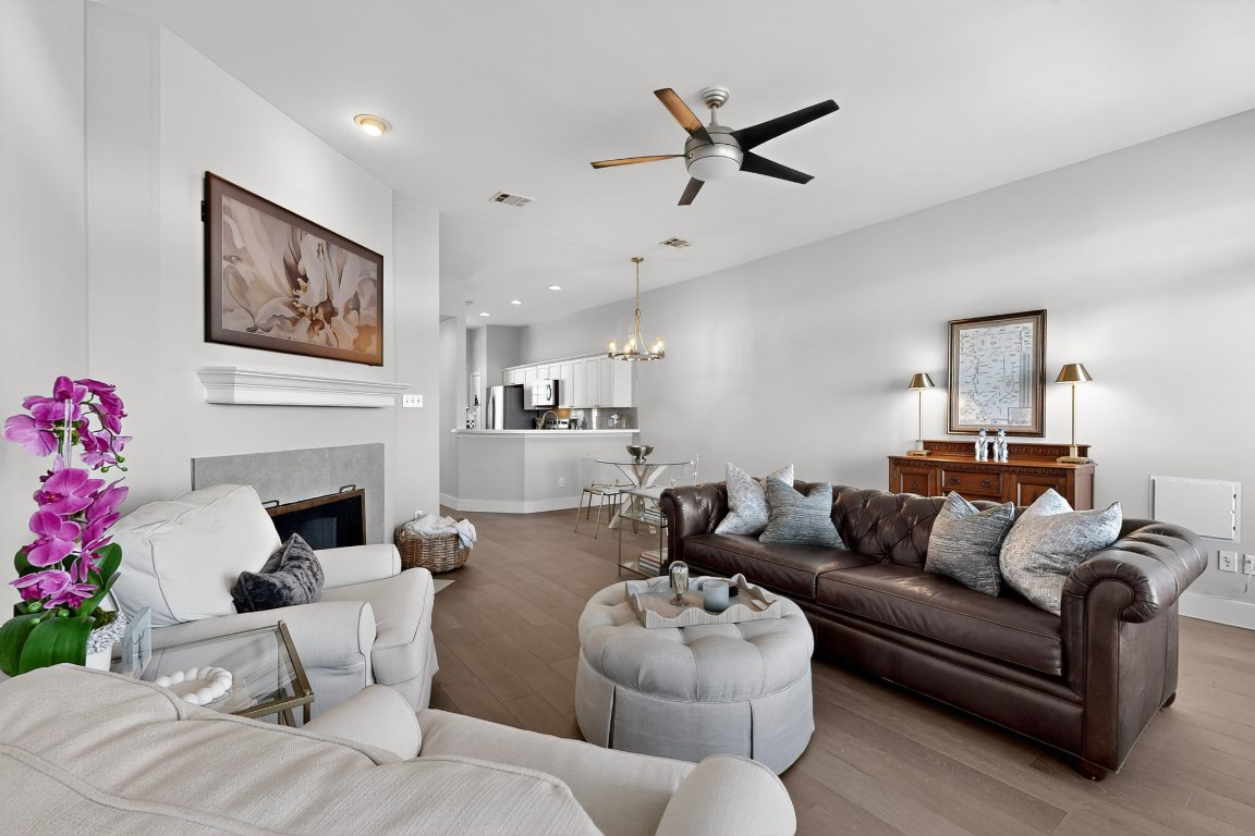2918 Ranch Road 620 North, Unit T250 Austin, TX 78734 - Photo 4 of 22 a living room with furniture a fireplace