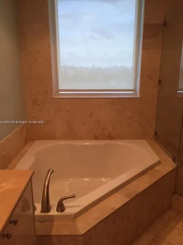 a close up of a bathtub