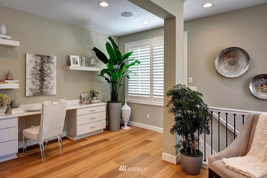 9911 Northeast 158th Street Bothell, WA 98011 - Photo 12 of 25 a living room with furniture potted plant a window and a potted plant