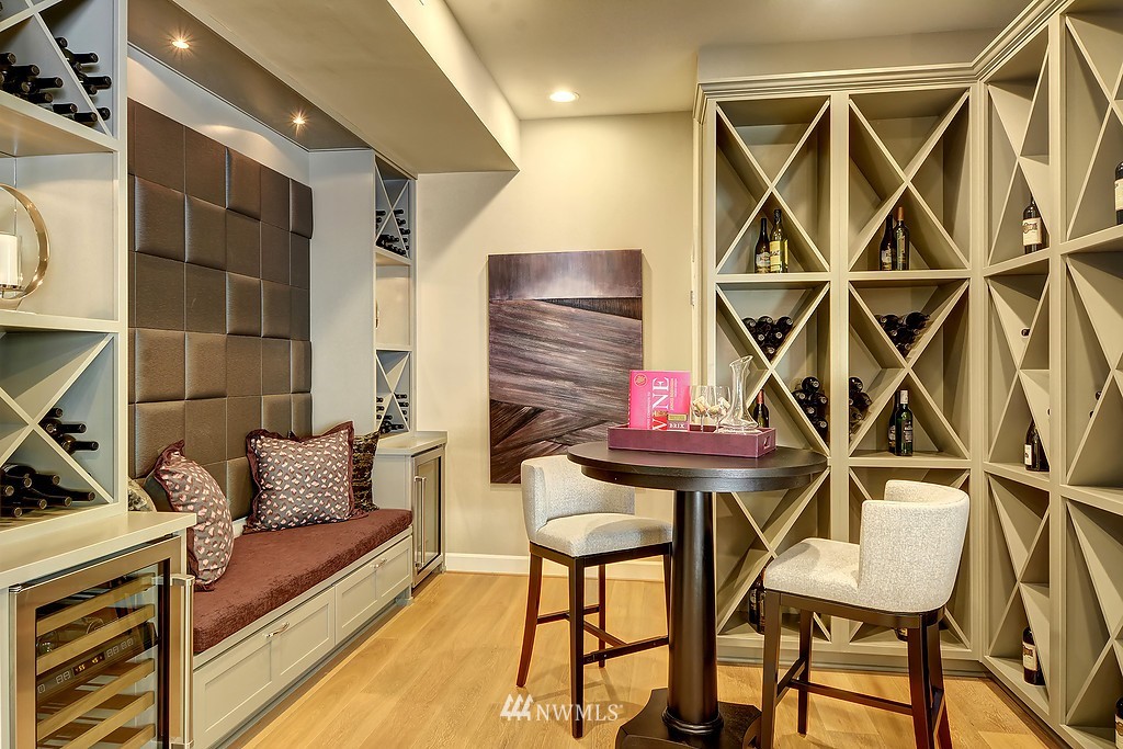 9911 Northeast 158th Street Bothell, WA 98011 - Photo 24 of 25 a dining room with furniture and wooden floor