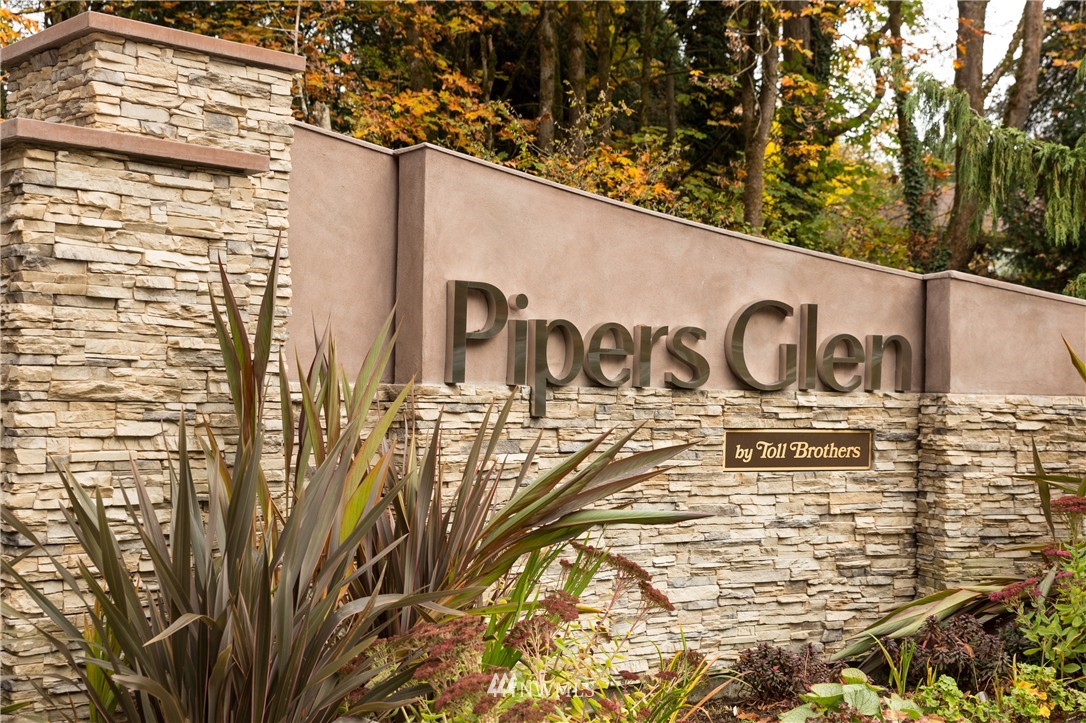 9911 Northeast 158th Street Bothell, WA 98011 - Photo 25 of 25 a street sign on a building